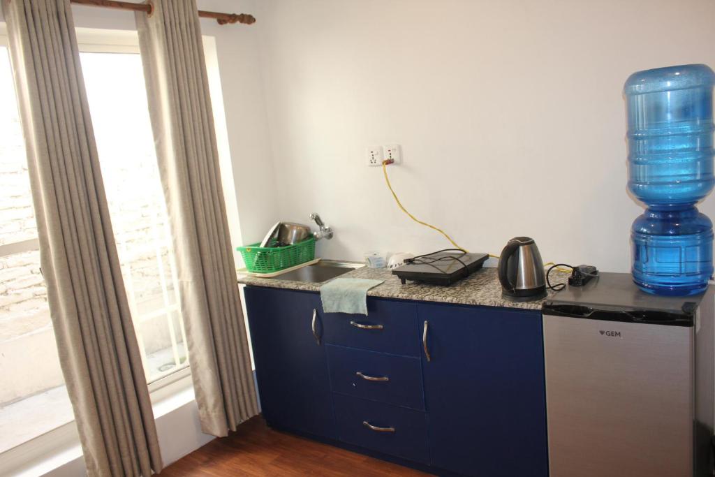 Kuchyň nebo kuchyňský kout v ubytování KAJI HOME