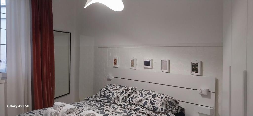 Un pat sau paturi într-o cameră la Loft Bacchiglione