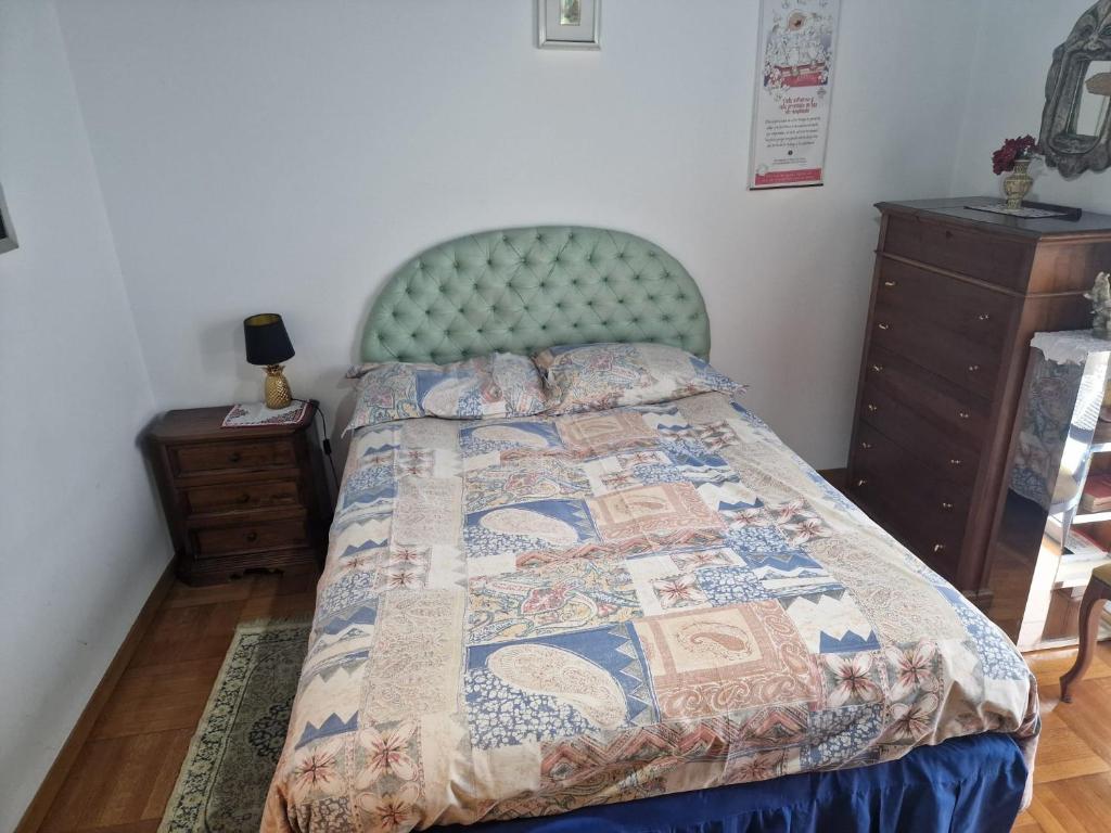 A bed or beds in a room at B&B Cavaliere Milano