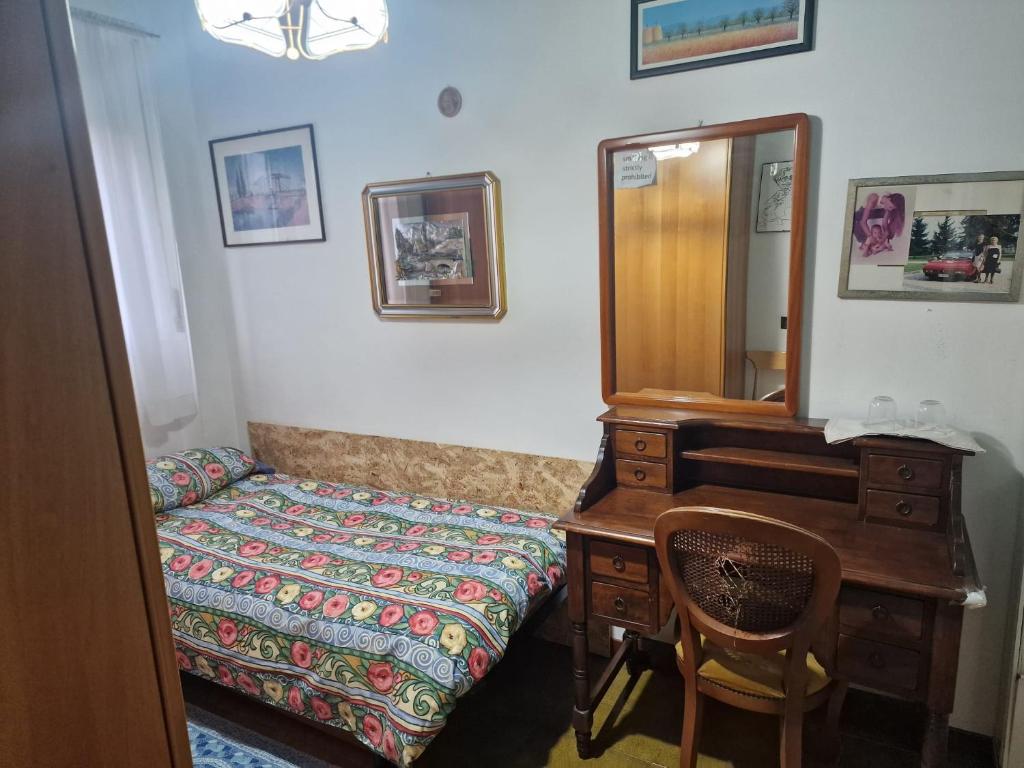 A bed or beds in a room at B&B Cavaliere Milano