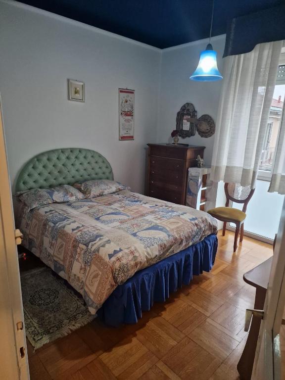 A bed or beds in a room at B&B Cavaliere Milano