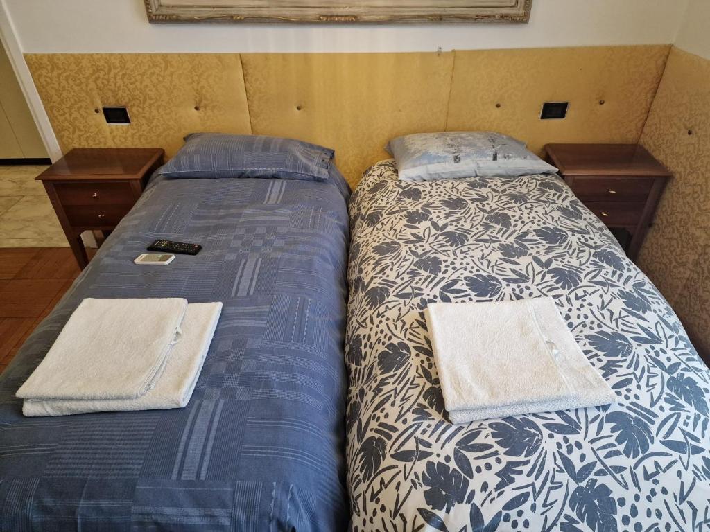 A bed or beds in a room at B&B Cavaliere Milano