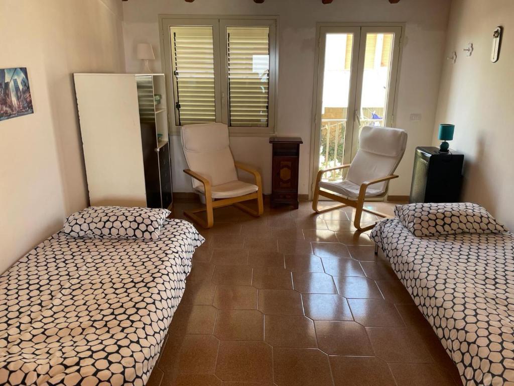 Postel nebo postele na pokoji v ubytování Casa Helenia Bruca