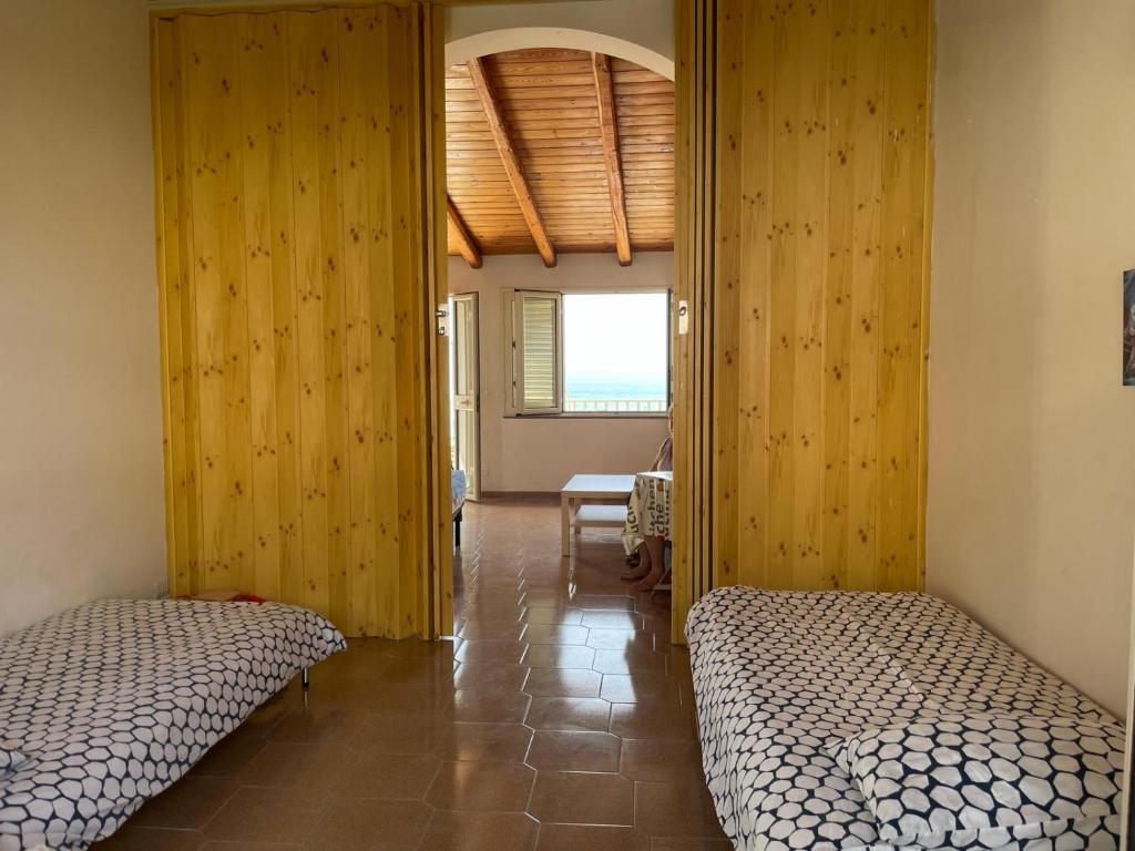 Postel nebo postele na pokoji v ubytování Casa Helenia Bruca