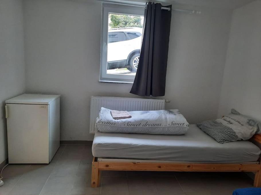 Postel nebo postele na pokoji v ubytování Flat Bangoua