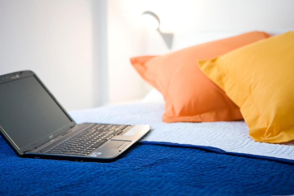 Cama ou camas em um quarto em Live & Dream