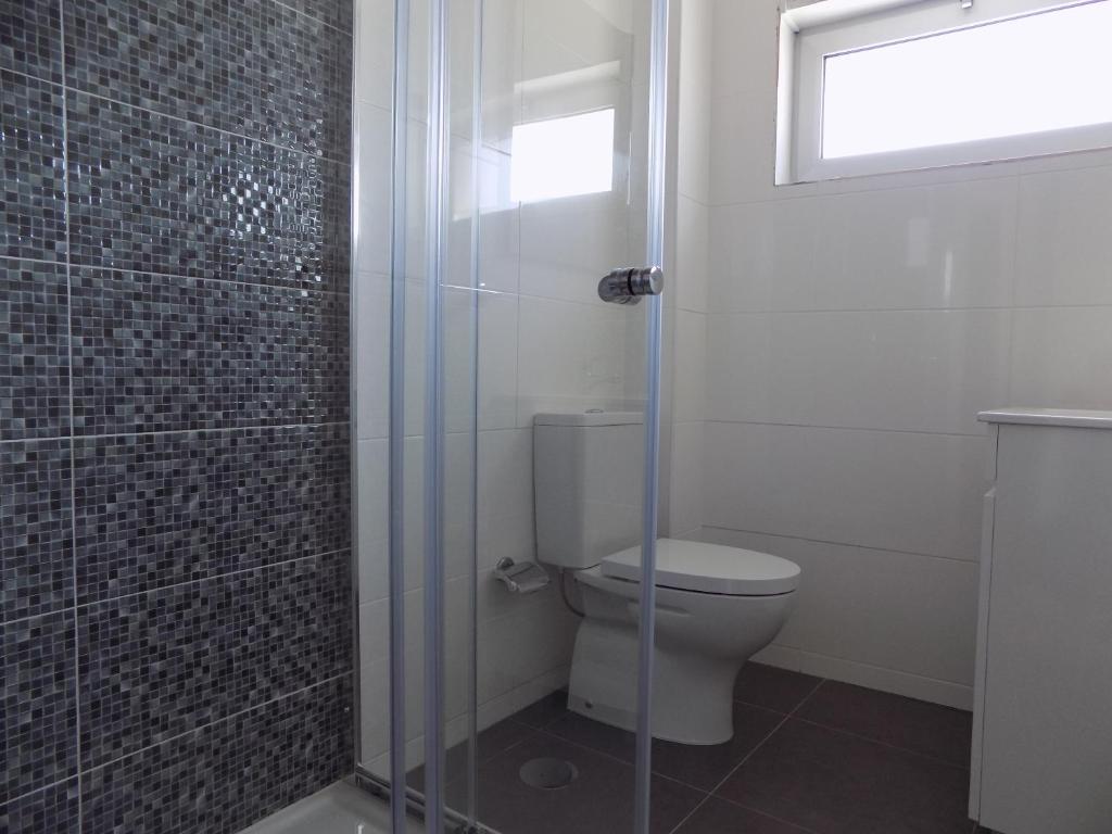 Koupelna v ubytování CMB Guesthouse