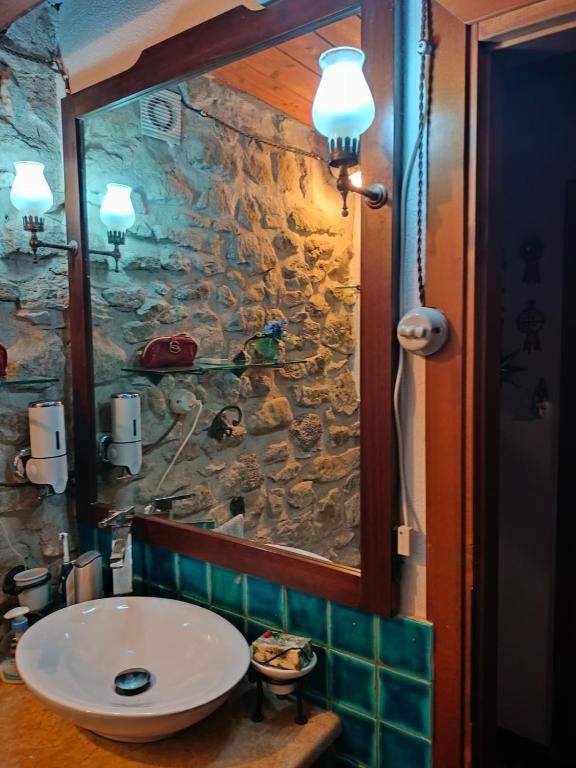 Koupelna v ubytování Casa di Pietra