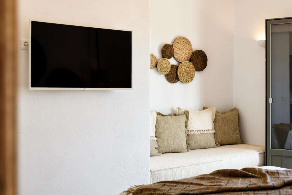 TV a/nebo společenská místnost v ubytování KIANO SUITES