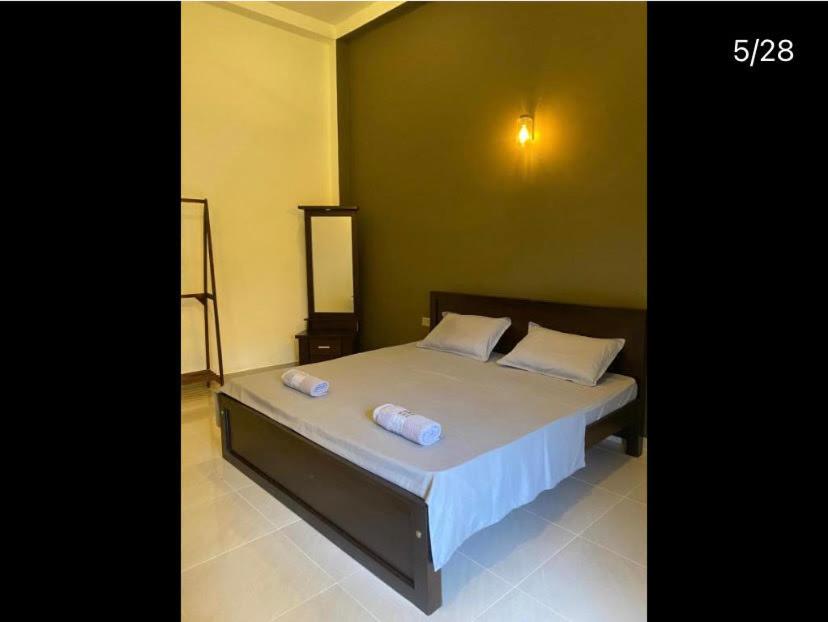 Postel nebo postele na pokoji v ubytování Negombo 146 Homestay