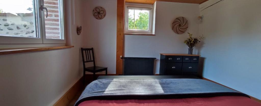 Postel nebo postele na pokoji v ubytování Villa Garona avec billard proche Pyrénées