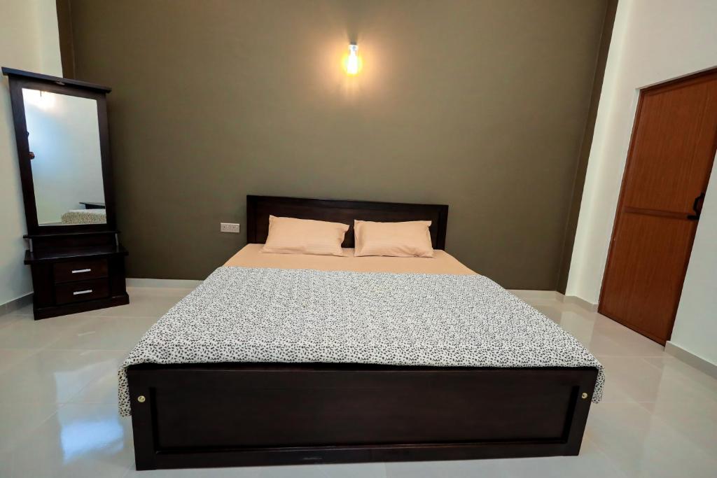 Postel nebo postele na pokoji v ubytování Negombo 146 Homestay
