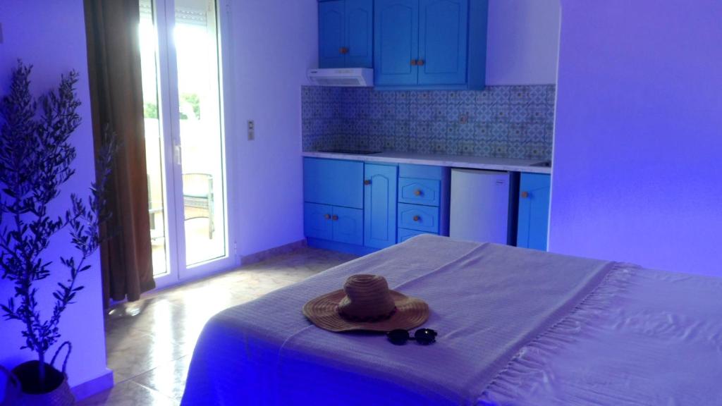 Postel nebo postele na pokoji v ubytování Papafotis Apartments & Suites