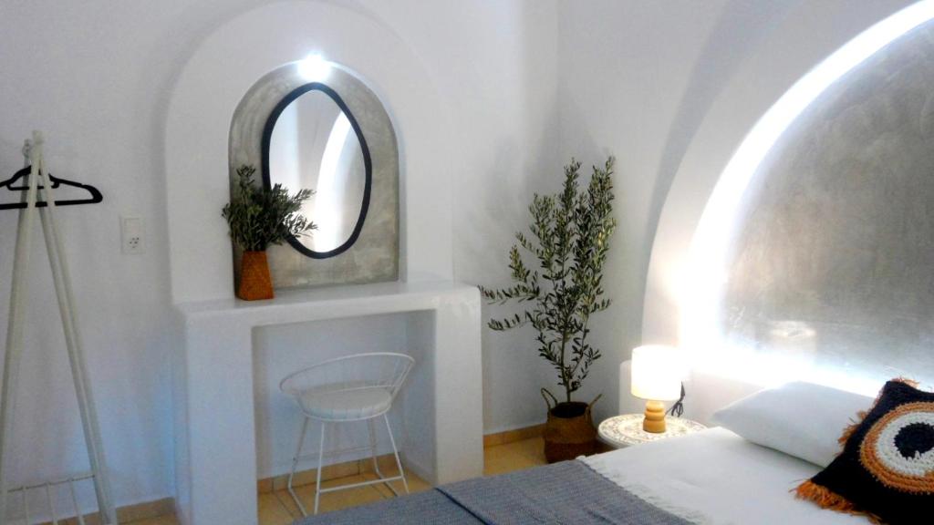 Postel nebo postele na pokoji v ubytování Papafotis Apartments & Suites