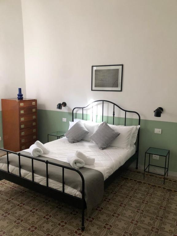 Postel nebo postele na pokoji v ubytování Caves Apartment
