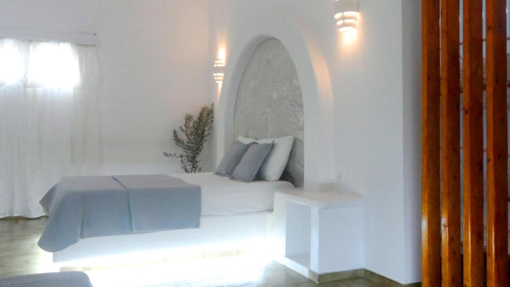 Postel nebo postele na pokoji v ubytování Papafotis Apartments & Suites