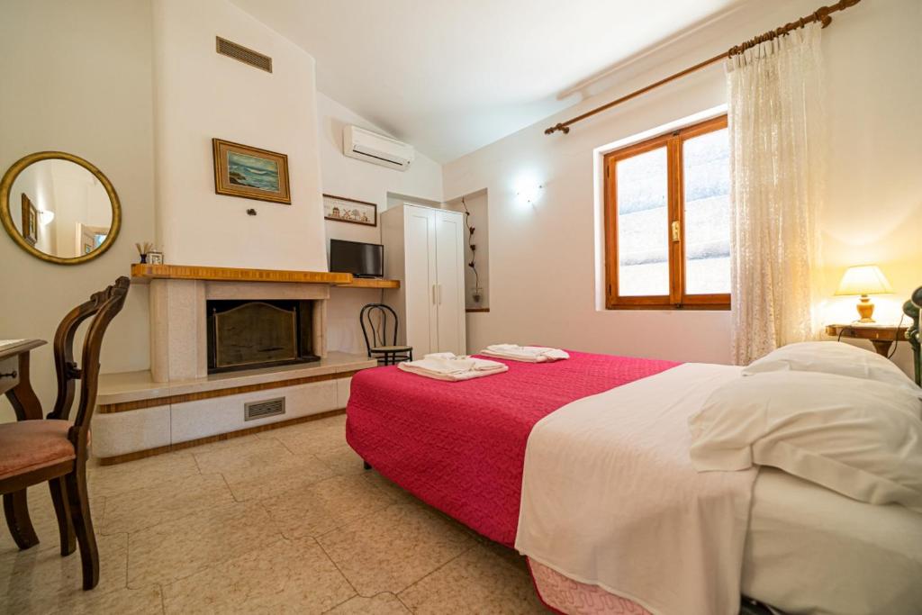 Postel nebo postele na pokoji v ubytování Villa Ray