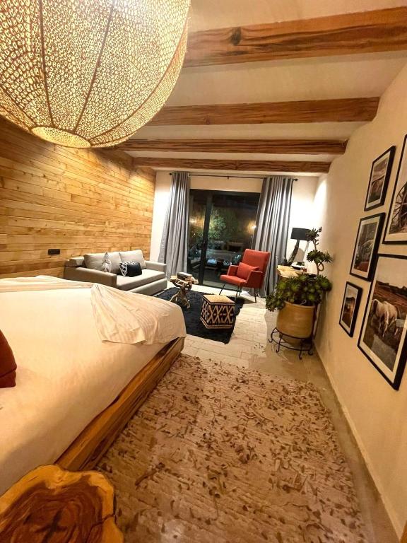 Postel nebo postele na pokoji v ubytování Bio et Bois -Luxury Bio Farm-