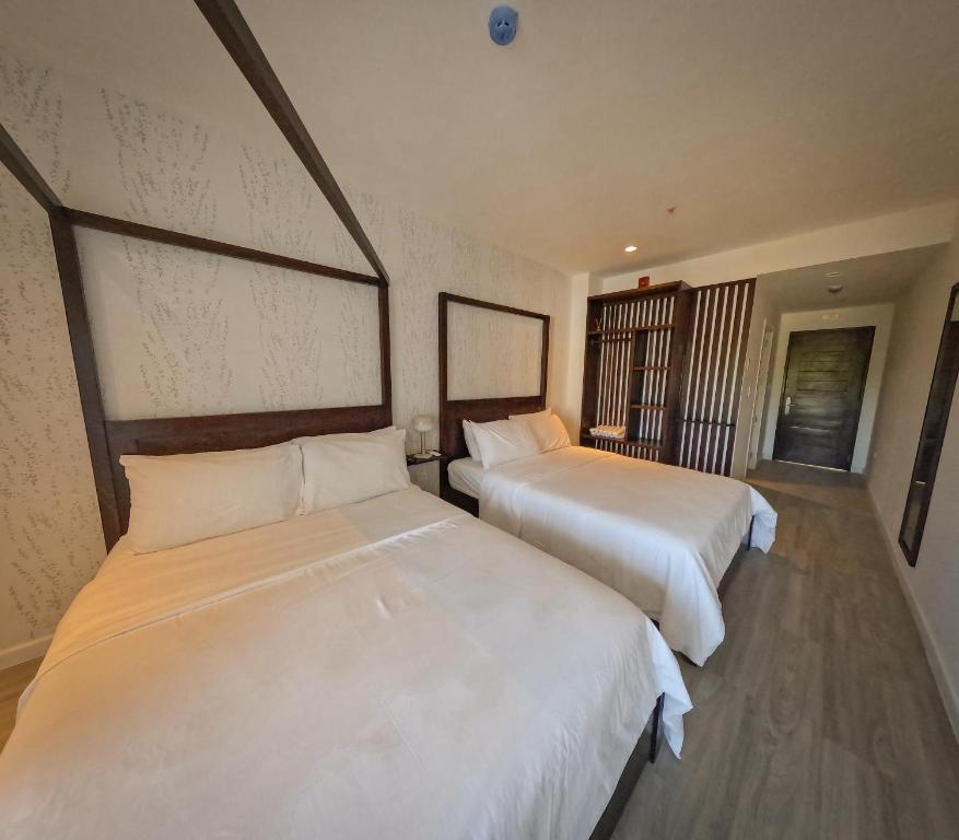 Postel nebo postele na pokoji v ubytování Hotel Pedasí Nature Paradise