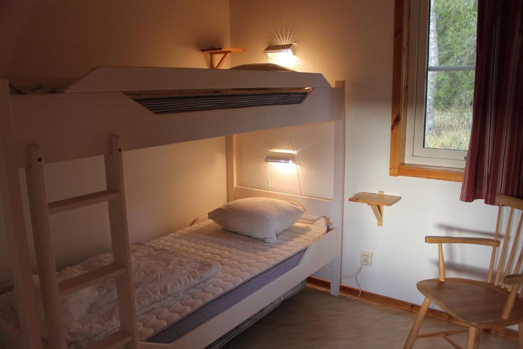Postel nebo postele na pokoji v ubytování Backs Semesterby