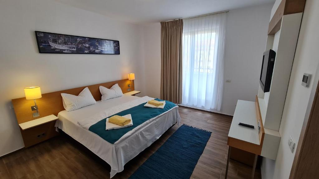 Ένα ή περισσότερα κρεβάτια σε δωμάτιο στο Jafar Resort 10 Penthouse