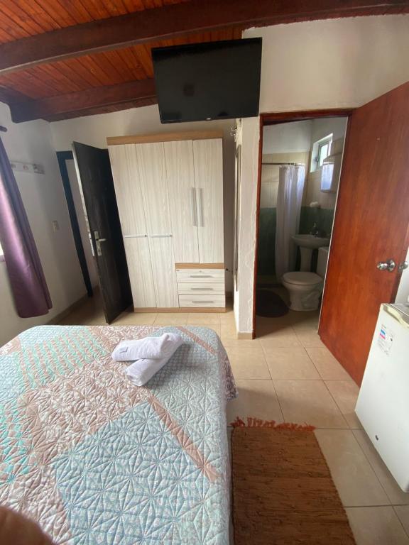 Postel nebo postele na pokoji v ubytování Habitación Juspe