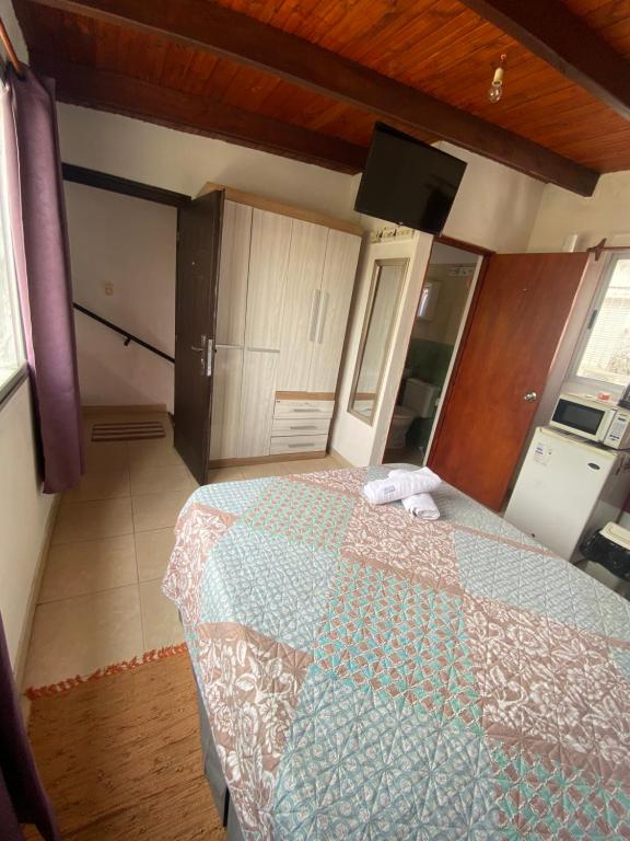 Postel nebo postele na pokoji v ubytování Habitación Juspe