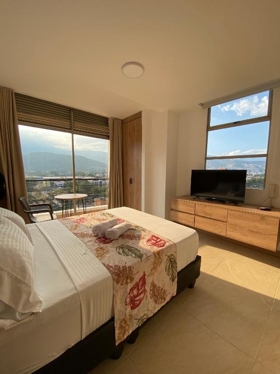 Letto o letti in una camera di Caliview Apartahotel Andalaya