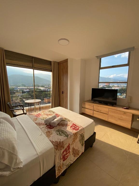 Letto o letti in una camera di Caliview Apartahotel Andalaya