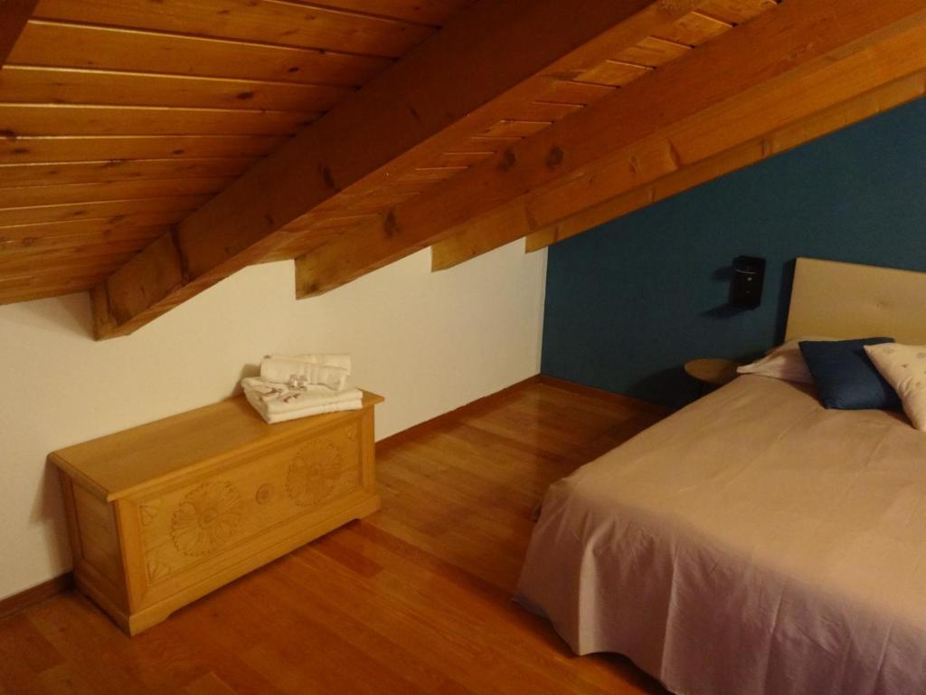 Postel nebo postele na pokoji v ubytování Hisa Karletavi