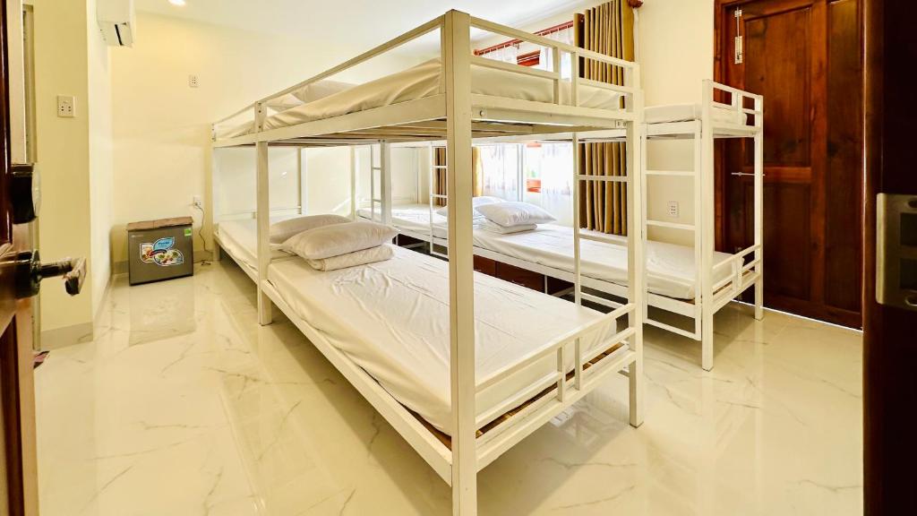 Двухъярусная кровать или двухъярусные кровати в номере 50b Homestay