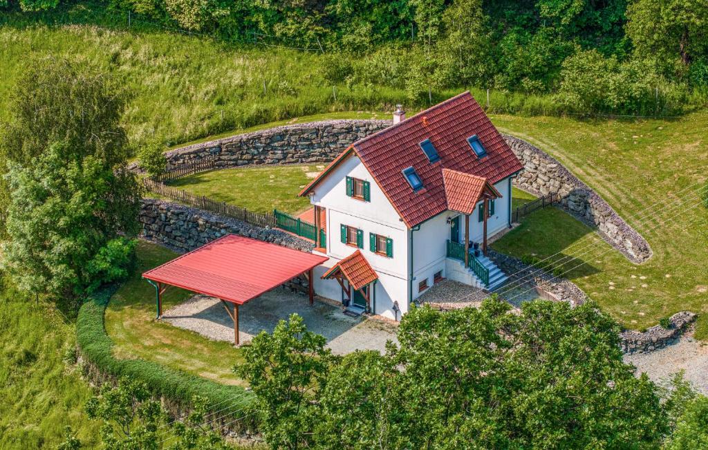 an overhead view of a house with a red roof at Nice Home In Gssing With Wifi in Güssing
