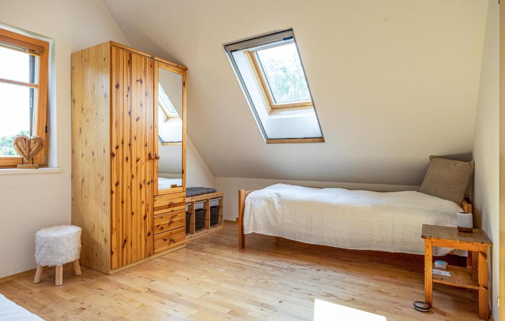 Postel nebo postele na pokoji v ubytování Ferienhaus In Guessing