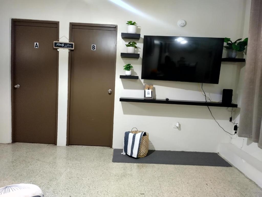 TV a/nebo společenská místnost v ubytování Boricua Guest House Apartment