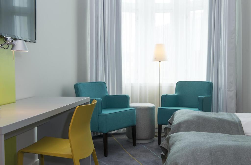 Postel nebo postele na pokoji v ubytování Thon Hotel Trondheim