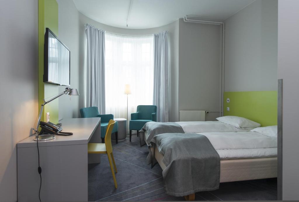 Postel nebo postele na pokoji v ubytování Thon Hotel Trondheim