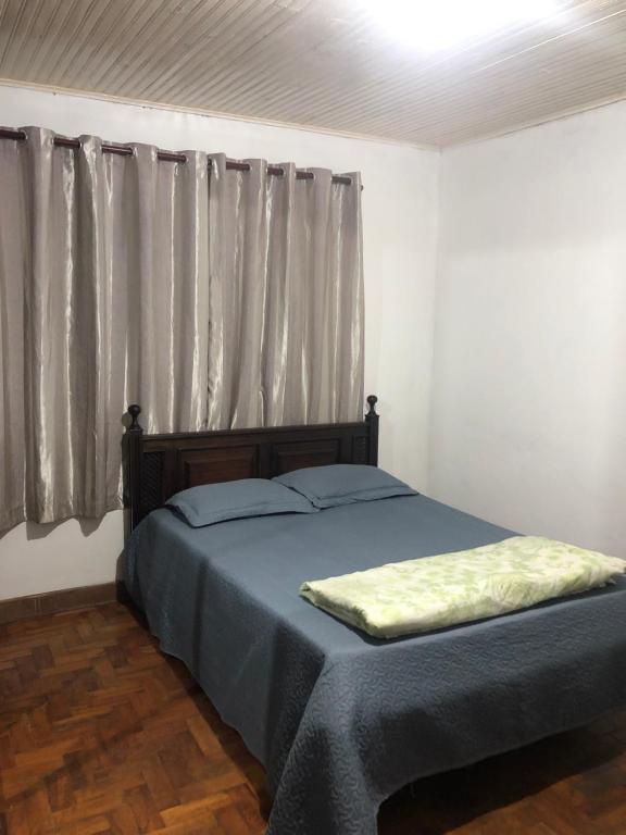 Voodi või voodid majutusasutuse Meire Gonçalves toas