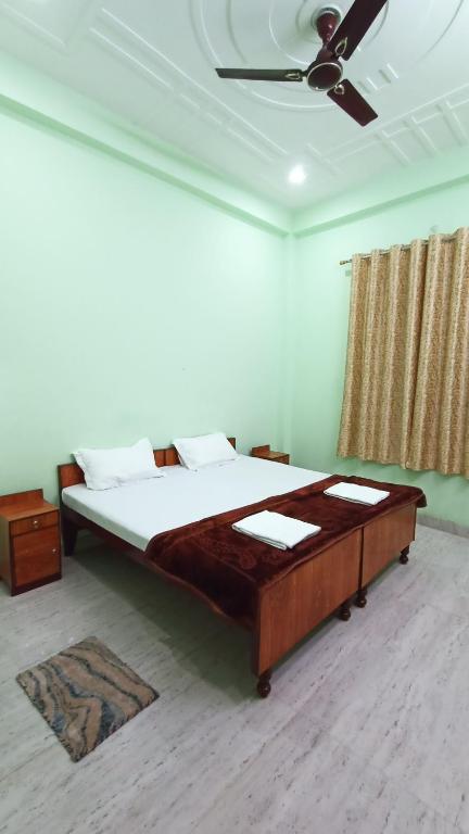 Voodi või voodid majutusasutuse ARJUN PAYING GUEST HOUSE toas