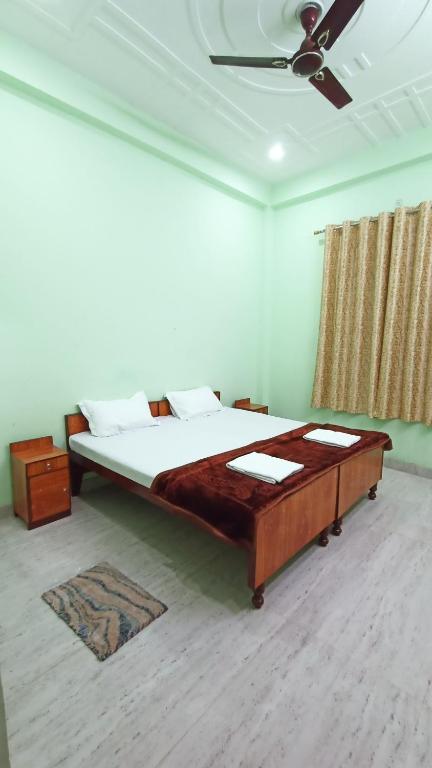 Voodi või voodid majutusasutuse ARJUN PAYING GUEST HOUSE toas