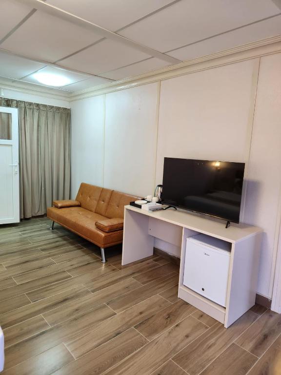 TV a/nebo společenská místnost v ubytování Lina Dreamland Resort