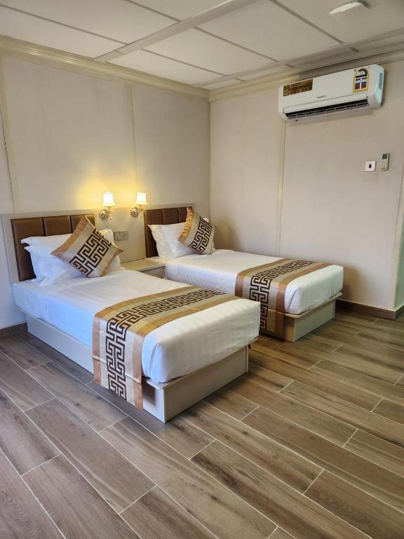 Postel nebo postele na pokoji v ubytování Lina Dreamland Resort