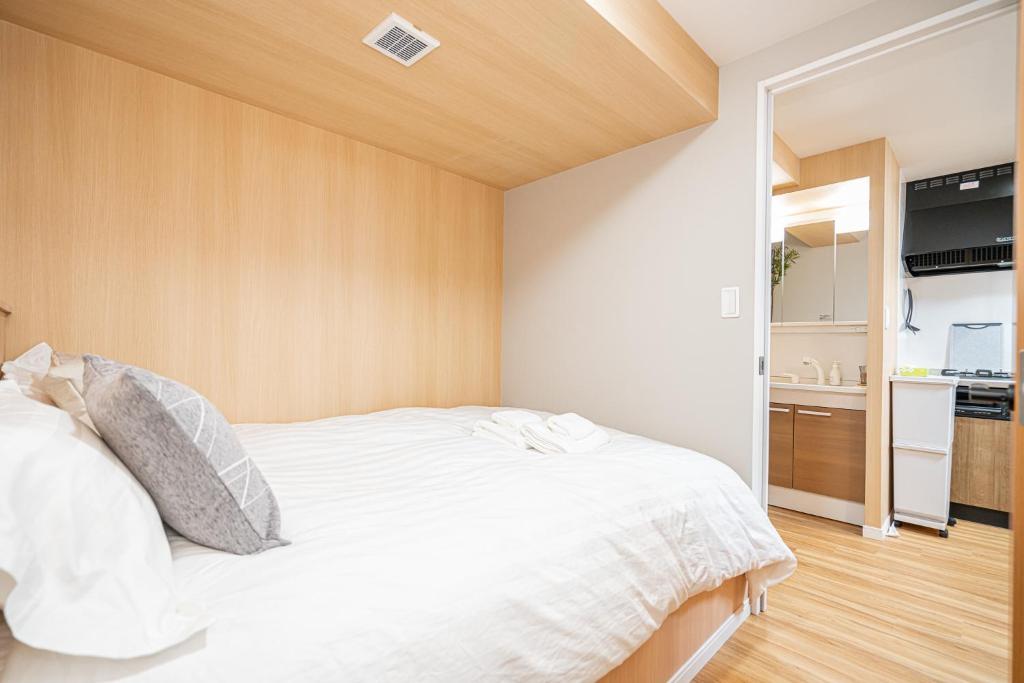 Kuchyň nebo kuchyňský kout v ubytování Sakura Suite 404