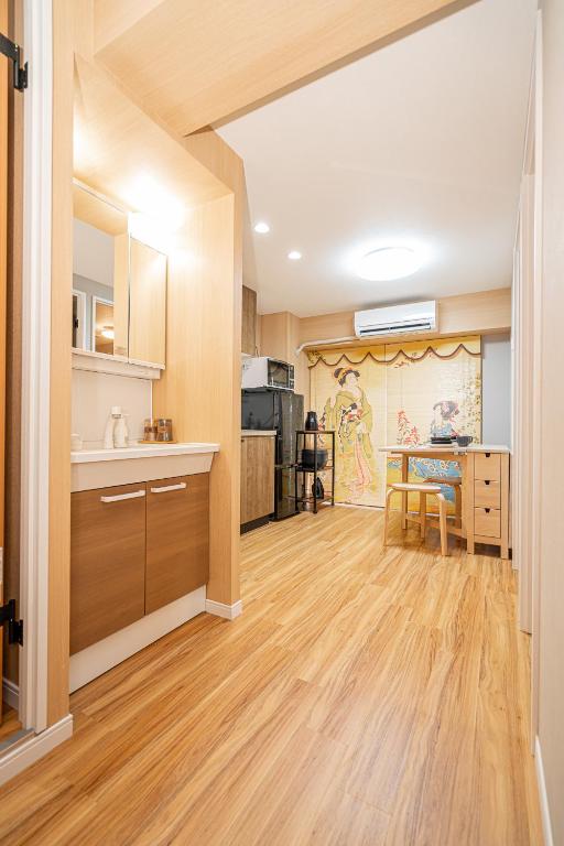Kuchyň nebo kuchyňský kout v ubytování Sakura Suite 404