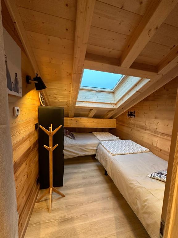 Postel nebo postele na pokoji v ubytování La Rose des neiges à Châtel