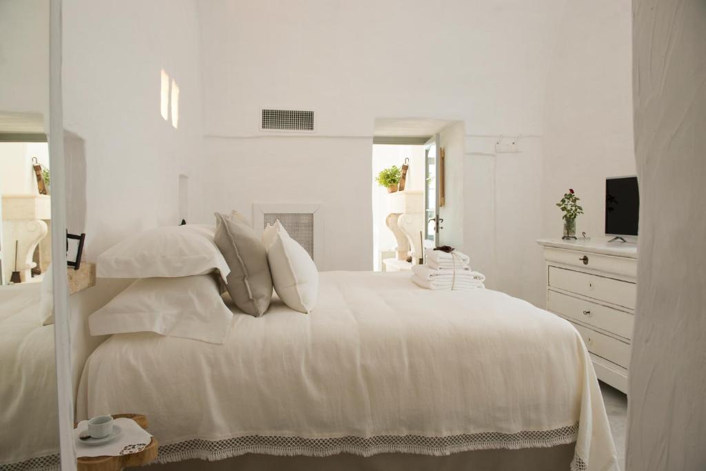 Postel nebo postele na pokoji v ubytování Masseria Le Torri