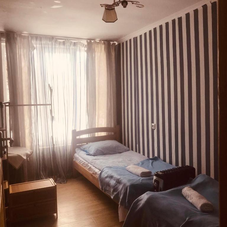 Postel nebo postele na pokoji v ubytování Sweetnight