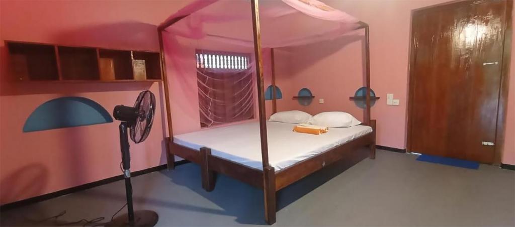 Postel nebo postele na pokoji v ubytování Breezy Beach Cabanas