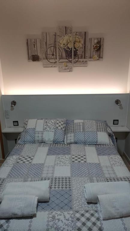 Postel nebo postele na pokoji v ubytování Casa Entre Rosales