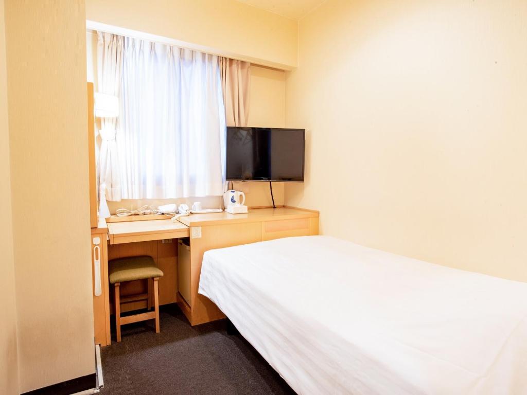 TV a/nebo společenská místnost v ubytování le Lac Hotel Yokkaichi