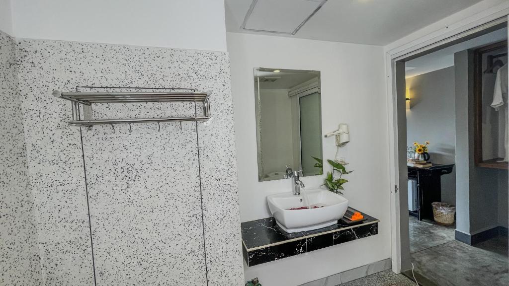 Koupelna v ubytování Dusit Hotel Siem Reap